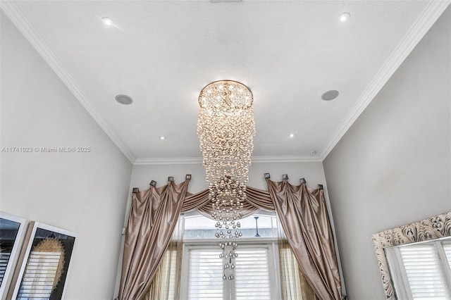 interior details featuring ornamental molding and a notable chandelier