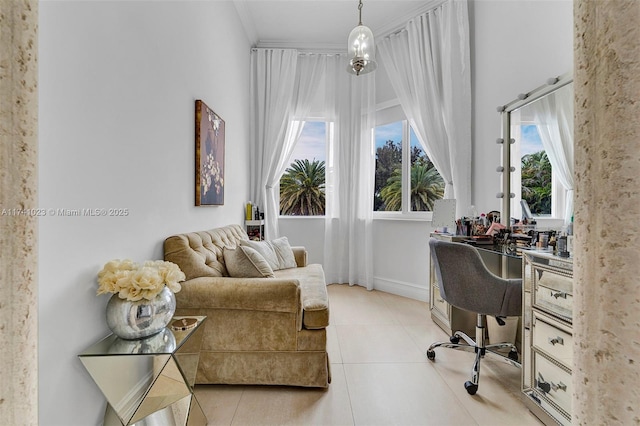 office area with light tile patterned floors, baseboards, and ornamental molding