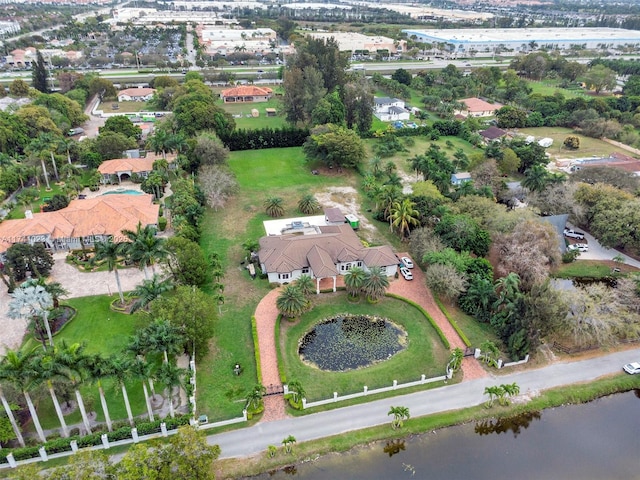 aerial view with a water view and a residential view