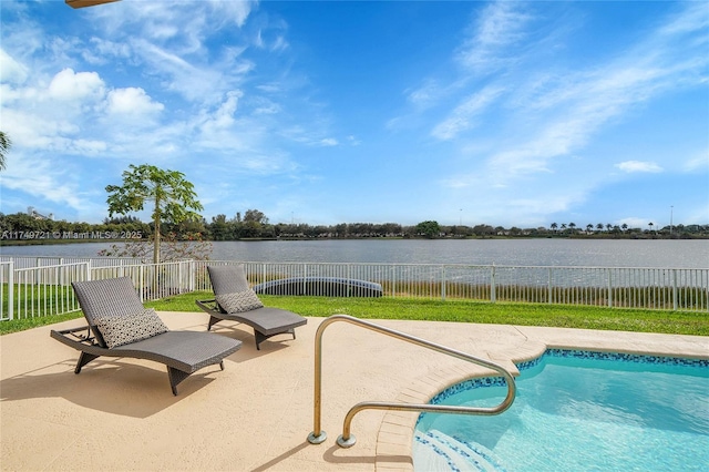 view of swimming pool featuring a water view, a patio area, a fenced backyard, and a fenced in pool