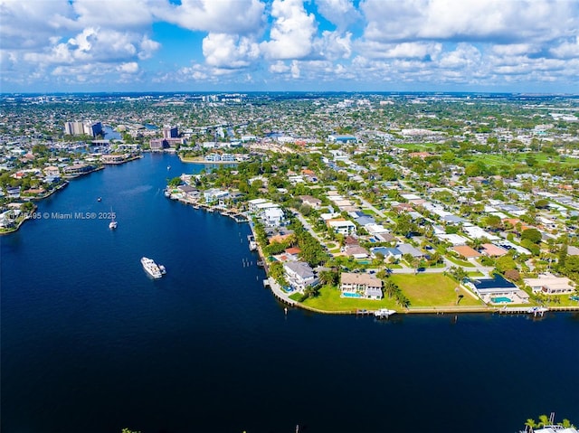 aerial view featuring a residential view and a water view