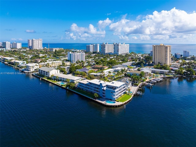 aerial view featuring a view of city and a water view