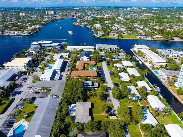 aerial view with a residential view and a water view