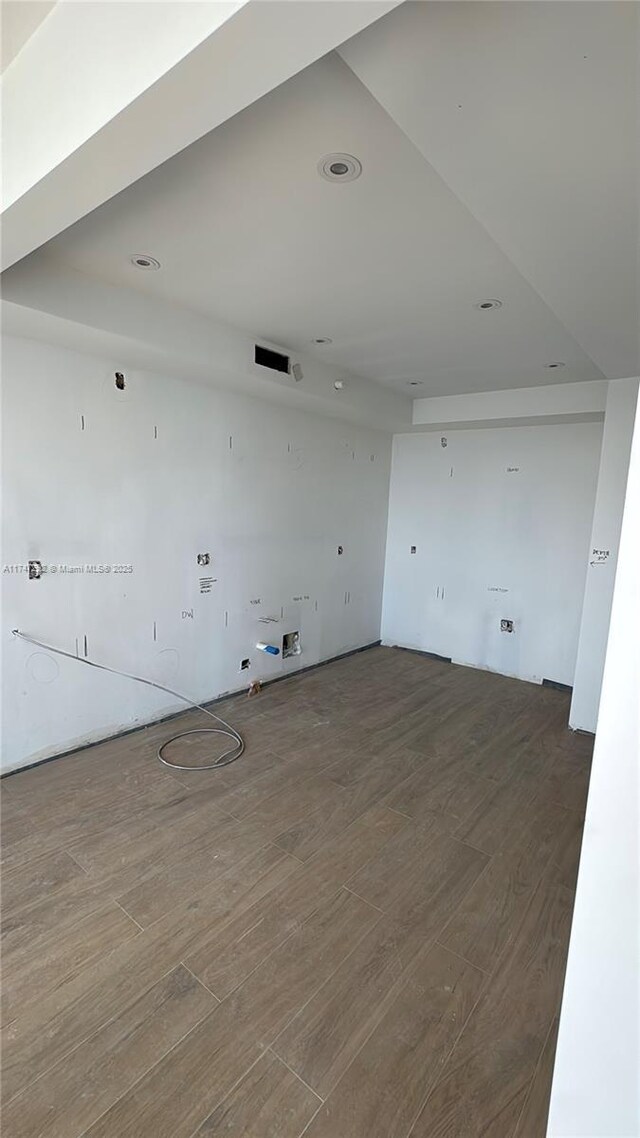 unfurnished room featuring wood finished floors