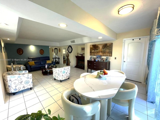 8415 SW 107th Ave Unit 363W, Miami, FL 33173 - dining space with light tile patterned floors, a fireplace, and recessed lighting