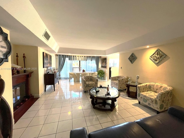 8415 SW 107th Ave Unit 363W, Miami, FL 33173 - living area with light tile patterned floors and a glass covered fireplace