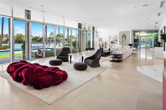 building lobby with a water view and visible vents