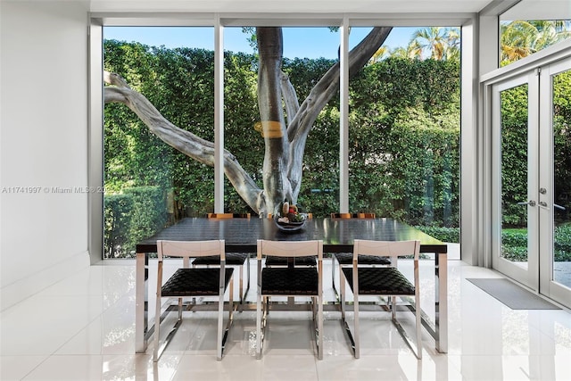 sunroom with french doors and a healthy amount of sunlight