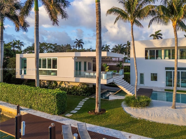 view of property featuring an outdoor pool