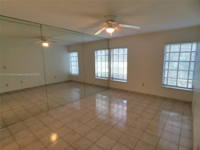 1821 Jefferson Ave Unit 205, Miami Beach, FL 33139 - spare room featuring a ceiling fan and light tile patterned floors