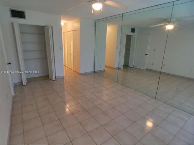 1821 Jefferson Ave Unit 205, Miami Beach, FL 33139 - unfurnished bedroom featuring light tile patterned flooring and a ceiling fan