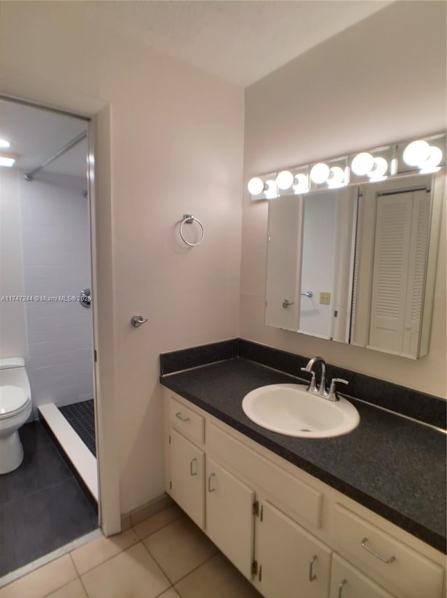 1821 Jefferson Ave Unit 205, Miami Beach, FL 33139 - bathroom featuring vanity, a stall shower, and tile patterned flooring