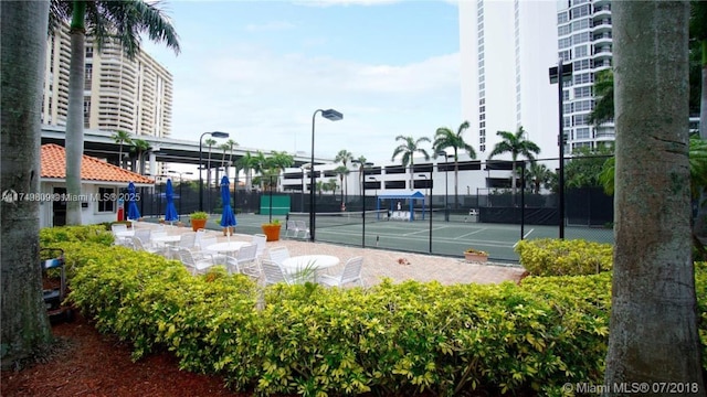 3530 Mystic Pointe Dr Unit 2303, Aventura, FL 33180 - view of tennis court featuring fence