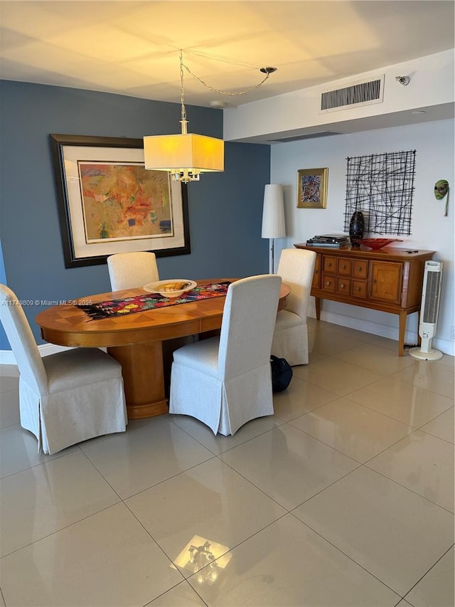 3530 Mystic Pointe Dr Unit 2303, Aventura, FL 33180 - dining space with light tile patterned floors and a chandelier