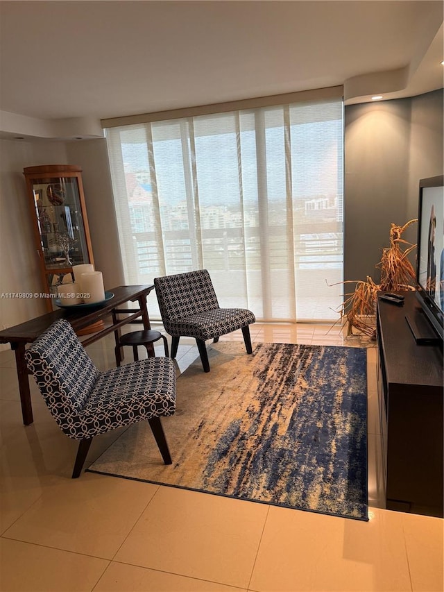 3530 Mystic Pointe Dr Unit 2303, Aventura, FL 33180 - sitting room featuring tile patterned flooring