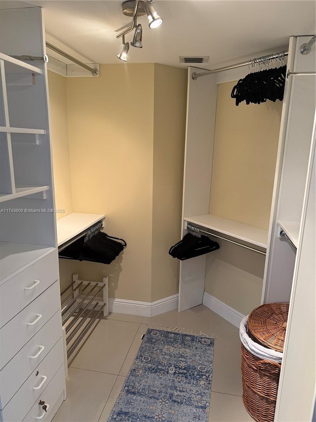 3530 Mystic Pointe Dr Unit 2303, Aventura, FL 33180 - spacious closet with light tile patterned floors