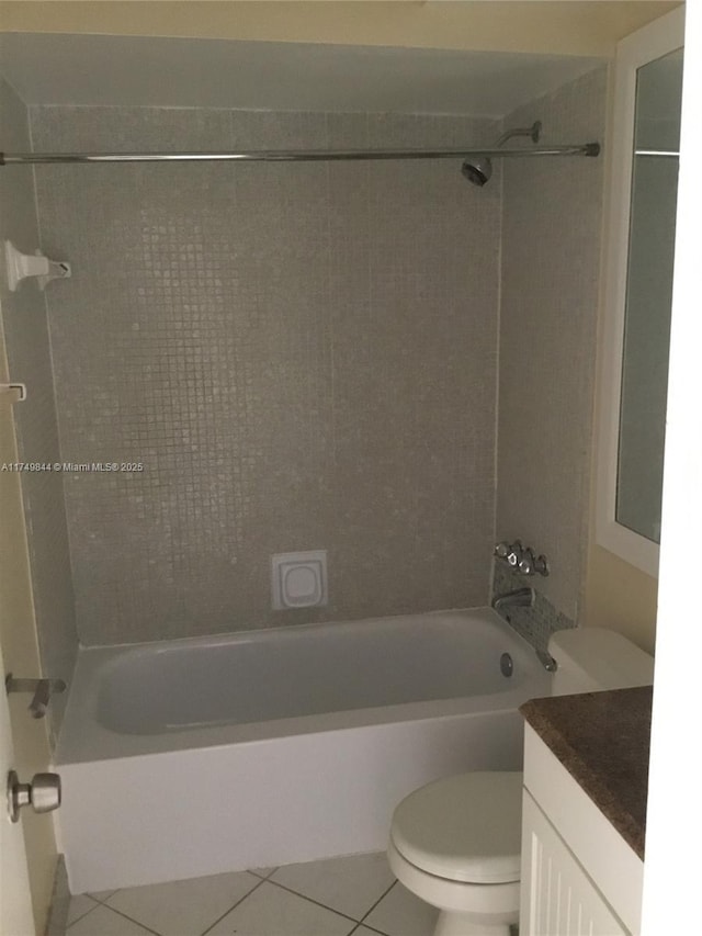 full bathroom with toilet, vanity, tub / shower combination, and tile patterned floors