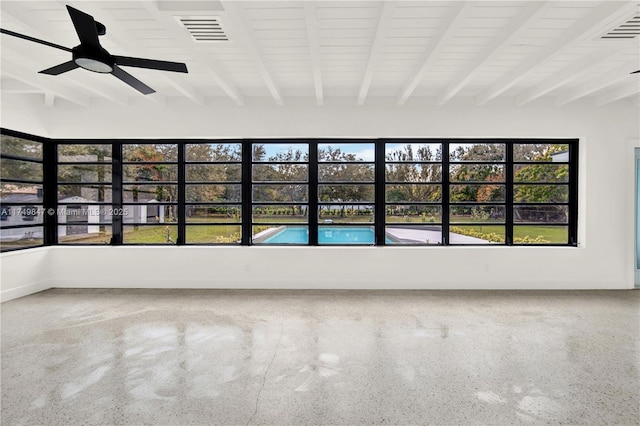 unfurnished sunroom with beam ceiling, visible vents, and ceiling fan