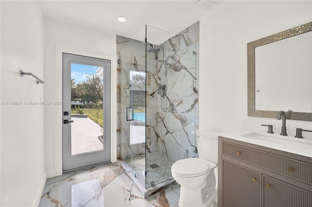 full bath with a marble finish shower, toilet, marble finish floor, and vanity