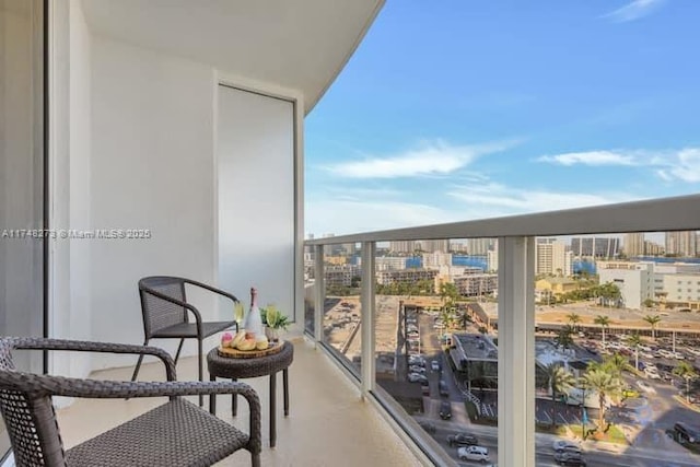 balcony featuring a city view