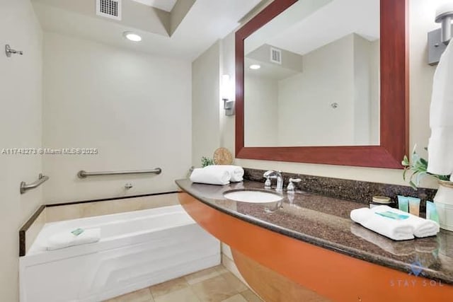 full bathroom featuring a garden tub, recessed lighting, visible vents, and tile patterned floors