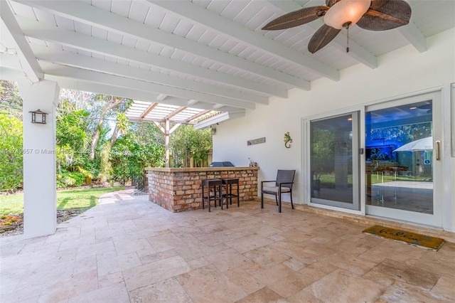 view of patio with a pergola, outdoor dry bar, and a ceiling fan