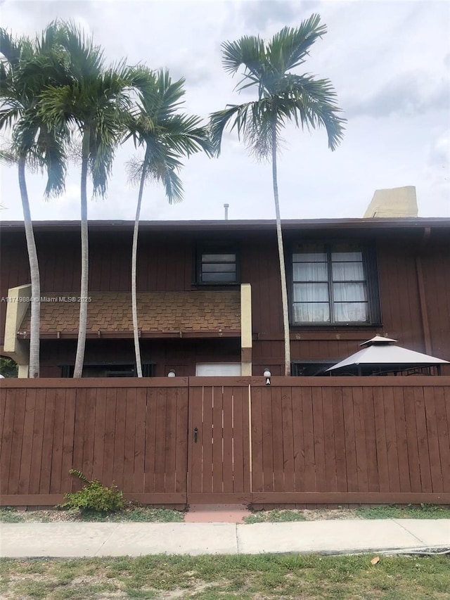 view of home's exterior with a fenced front yard