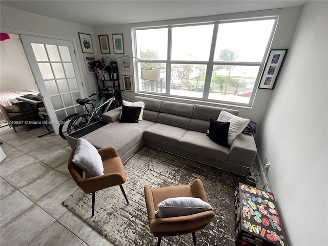 living area featuring tile patterned flooring