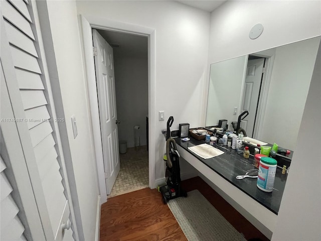 bathroom featuring tile patterned flooring and vanity