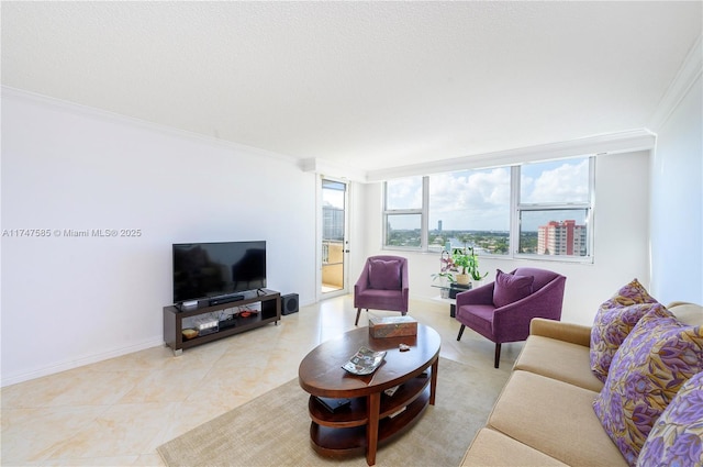 living area featuring light tile patterned floors, ornamental molding, a textured ceiling, and baseboards