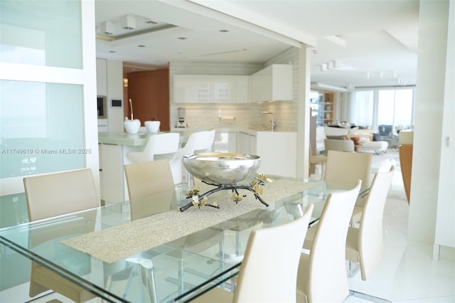 dining space with light tile patterned floors