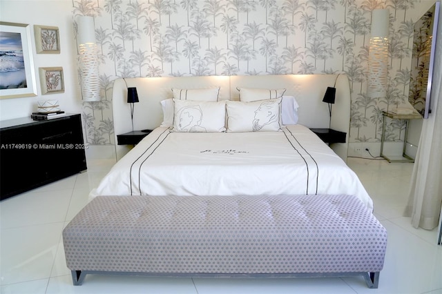 bedroom with tile patterned flooring and wallpapered walls