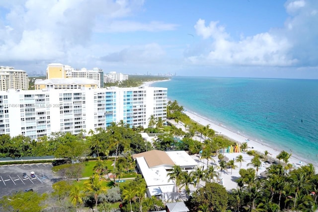 aerial view featuring a water view and a view of the beach