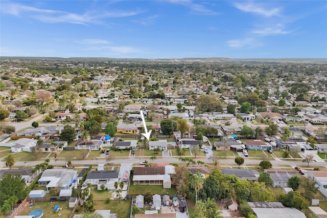 birds eye view of property with a residential view