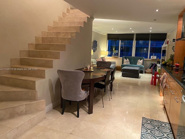 dining room with recessed lighting and light tile patterned flooring