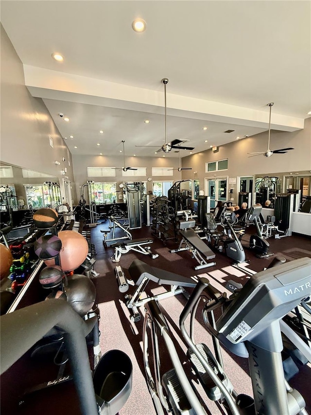 exercise room with recessed lighting and ceiling fan