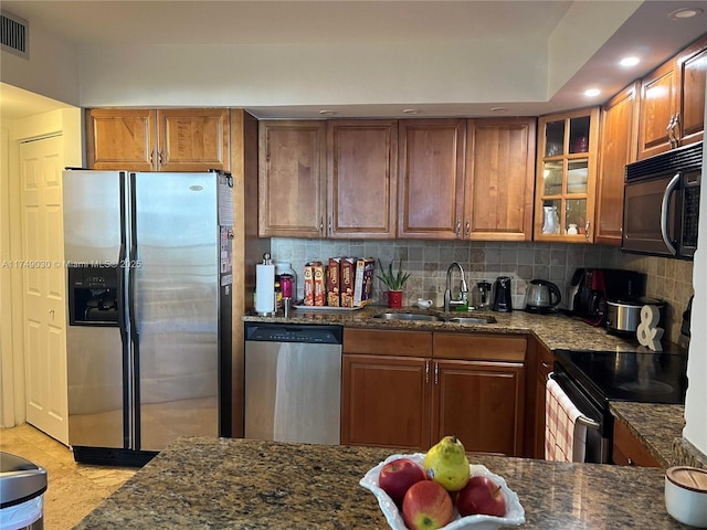 20281 E Country Club Dr Unit 1105, Aventura, FL 33180 - kitchen with dark stone counters, appliances with stainless steel finishes, a sink, and glass insert cabinets