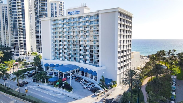 view of building exterior featuring a water view