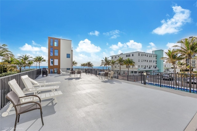 view of patio / terrace with outdoor dining area and fence