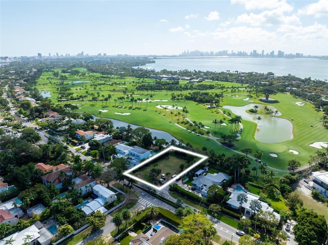 bird's eye view featuring a view of city, a water view, and golf course view