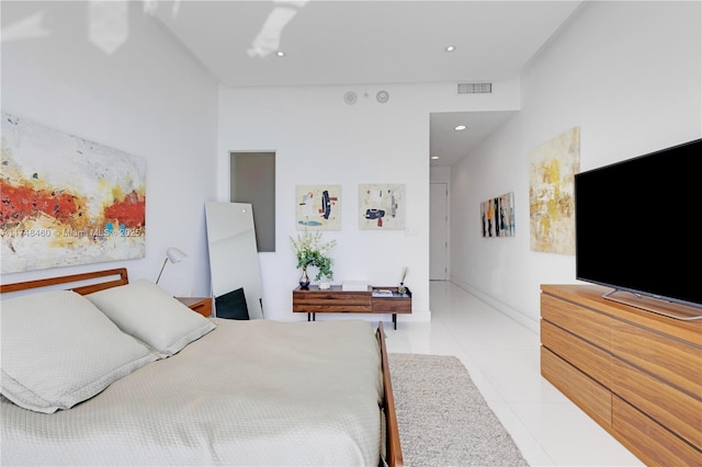 bedroom featuring recessed lighting, visible vents, baseboards, and light tile patterned floors