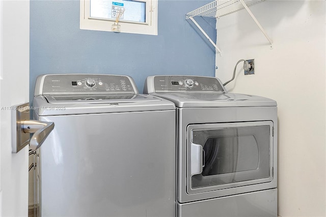 laundry room with laundry area and washer and dryer