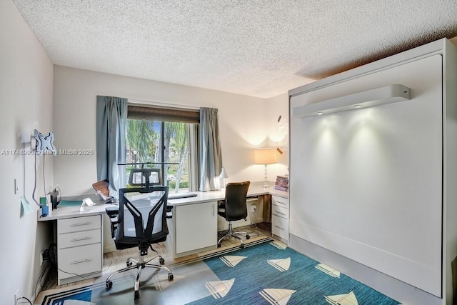 office with a textured ceiling