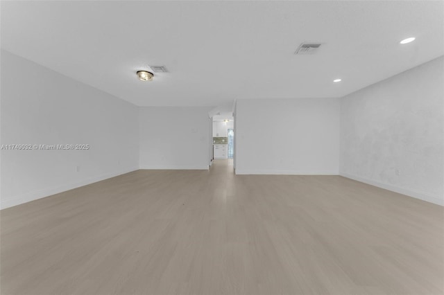 9745 NW 37th St Unit 9745, Sunrise, FL 33351 - spare room with recessed lighting, baseboards, visible vents, and light wood finished floors