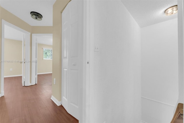 9745 NW 37th St Unit 9745, Sunrise, FL 33351 - corridor with baseboards and wood finished floors