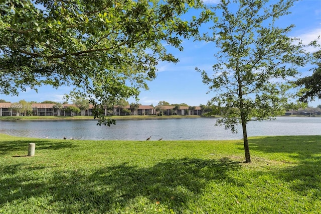 9745 NW 37th St Unit 9745, Sunrise, FL 33351 - property view of water featuring a residential view