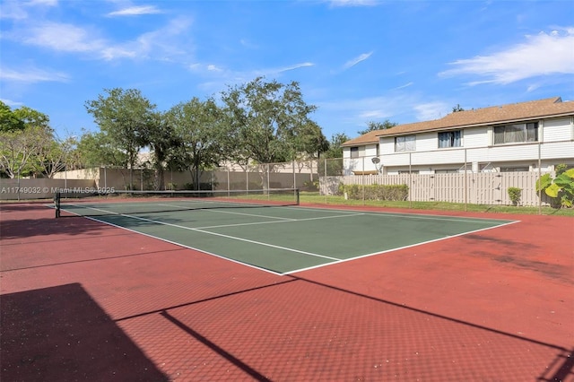 9745 NW 37th St Unit 9745, Sunrise, FL 33351 - view of tennis court with fence and community basketball court