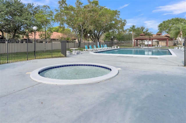 9745 NW 37th St Unit 9745, Sunrise, FL 33351 - pool featuring a gazebo, fence, and a patio area
