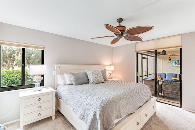 bedroom with light carpet, access to exterior, and a ceiling fan