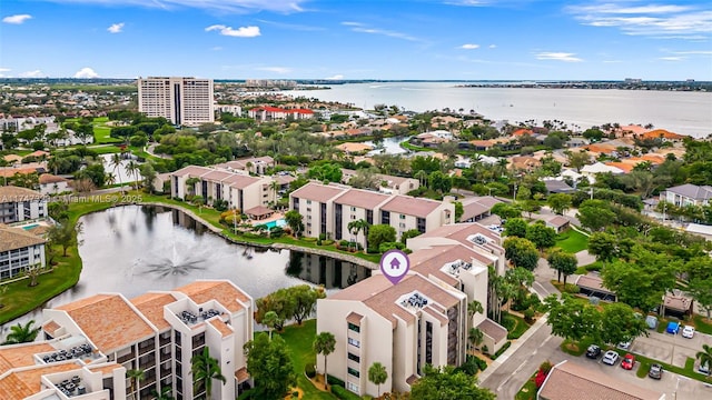 bird's eye view with a water view and a residential view